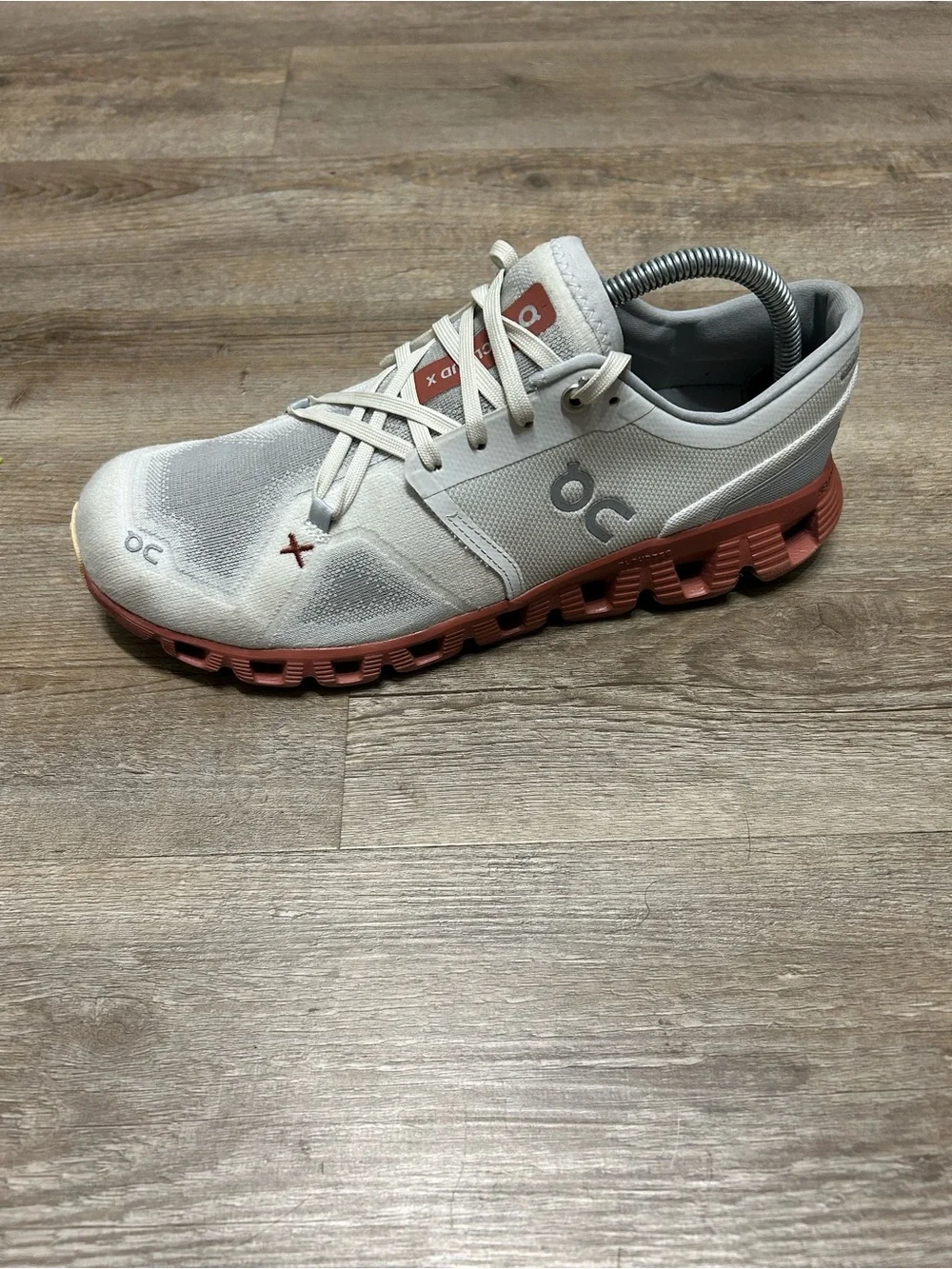 On Running Men's Cloudboom Athletic Shoes - Cream with Rust Accents